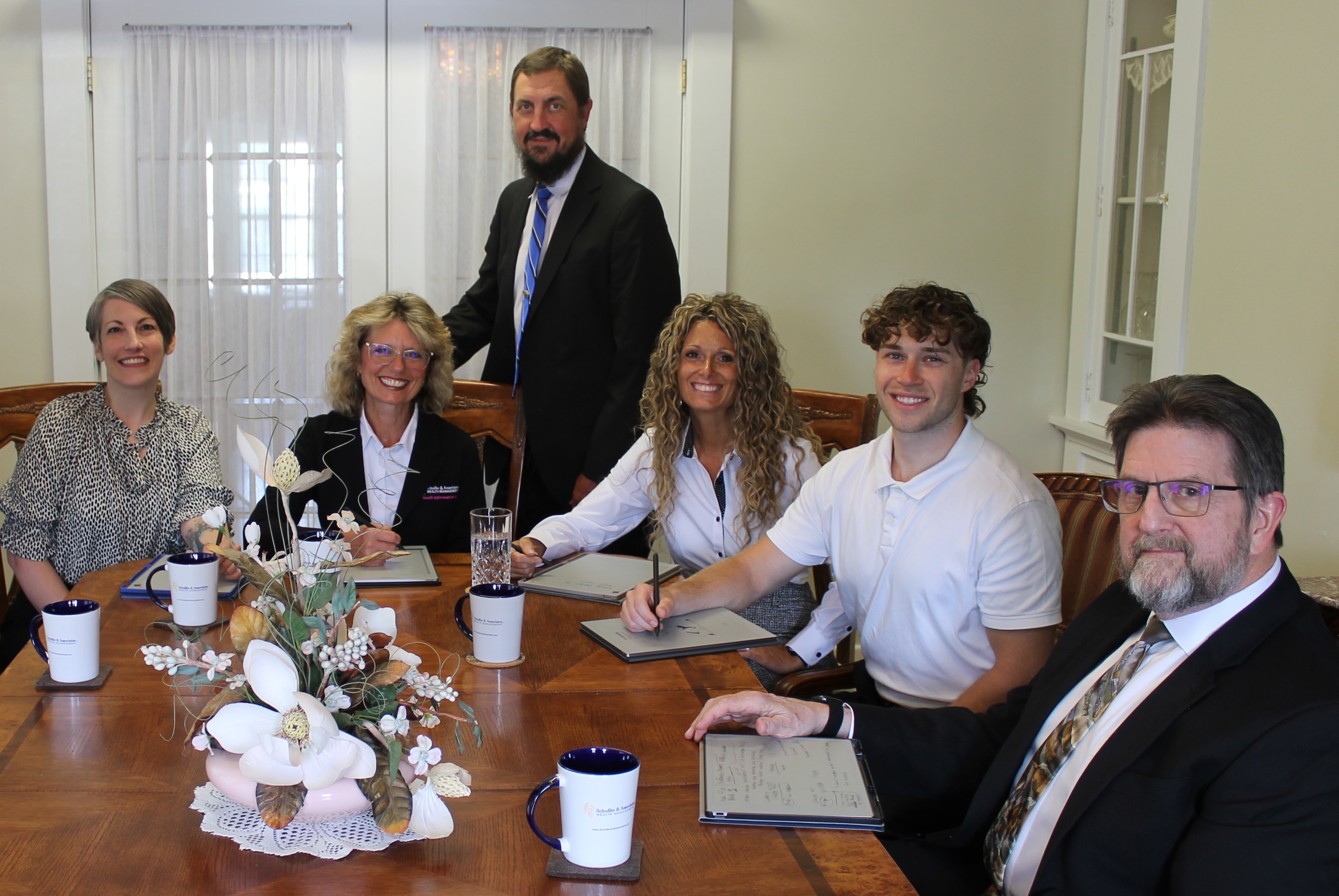 picture of the Schulfer & Associates team members